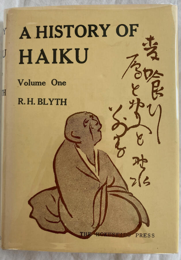 A History of Haiku Image of the cover of A History of Haiku: Volume One, by R.H. Blyth, showing a kneeling monk looking up at descending lines of Japanese characters.